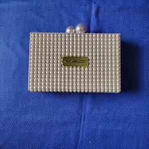 M.A.C Cosmetics limited edition pearl clutch.